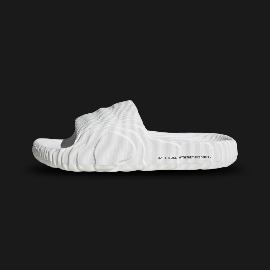 White Island Club Adilette 22 Slides with brand logo on a white background. Luxuntique offers authentic Adidas sandals at the lowest prices in Sri Lanka.