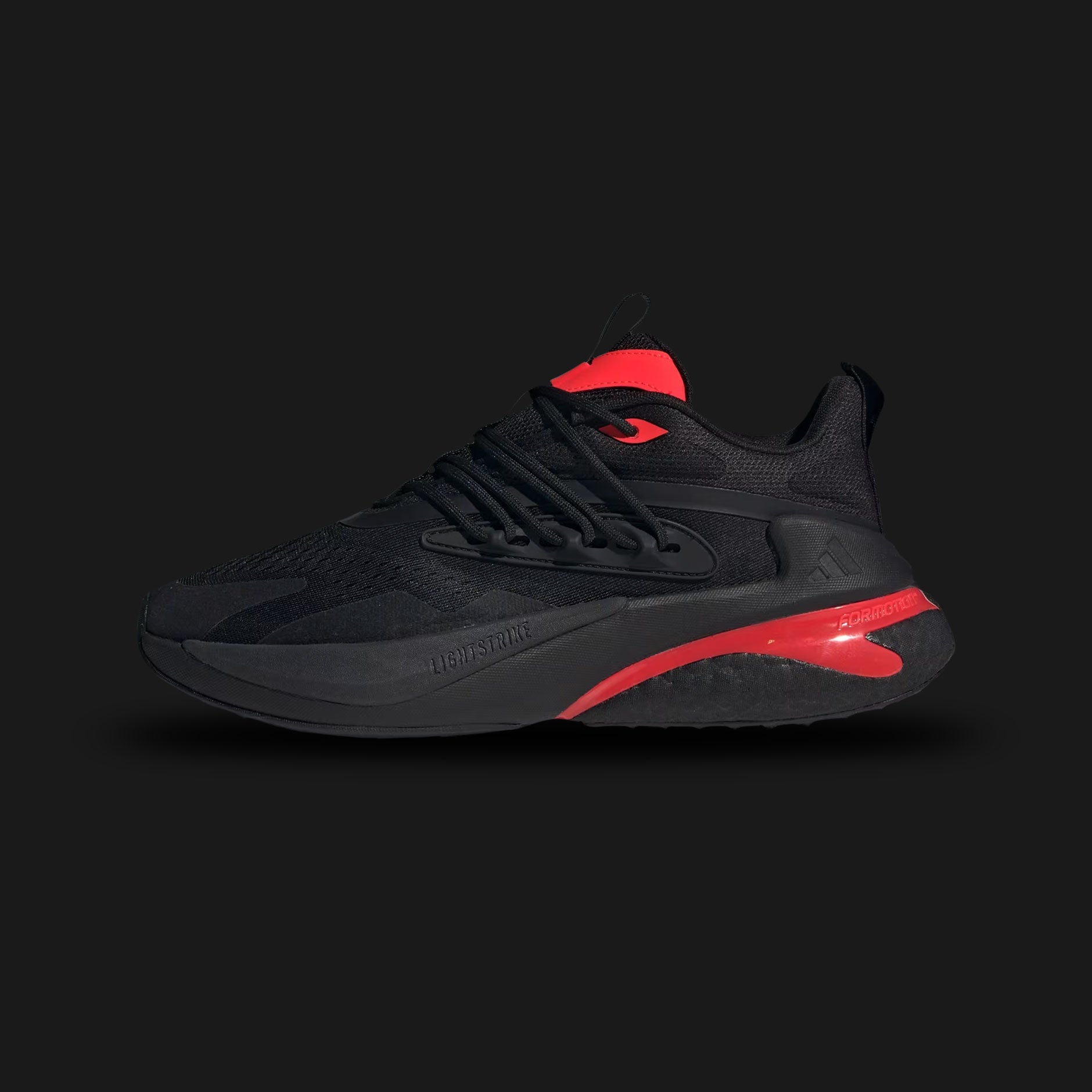 Adidas Alphaboost V2 shoes in Core Black and Lucid Red (JH6957). Features a breathable engineered mesh upper, multi-component Alphaboost midsole with BOOST cushioning, supportive heel counters, and a durable Adiwear rubber outsole. Luxuntique guarantees 100% authentic footwear.