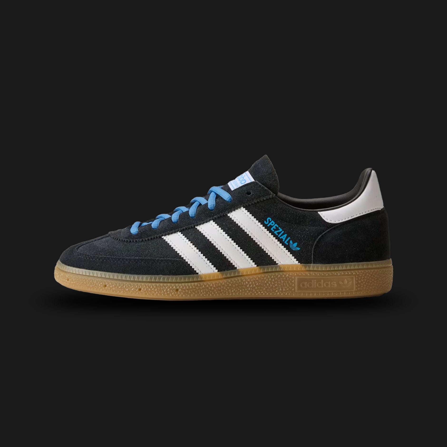 Adidas Argentina Handball Spezial shoes in Core Black and Cloud White (HP3673). Features a federation edition premium soft suede upper, classic leather Three-Stripes, retro T-toe overlay, and a classic low-profile gum rubber outsole. Luxuntique guarantees 100% authentic footwear in Sri Lanka.