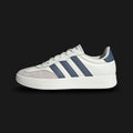 Adidas Barreda shoes in Off White, Preloved Ink, and Grey One (JR1318). Features a classic court-inspired profile with a durable synthetic upper, breathable perforations, and a supportive rubber cupsole for stability. Luxuntique guarantees 100% authentic "Adidas" footwear in Sri Lanka.