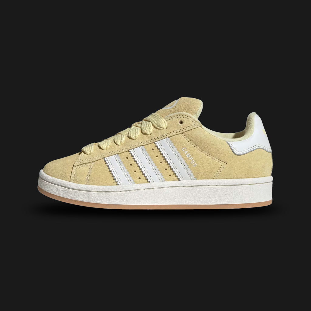 Adidas Campus 00s shoes in Core White and Almost Yellow (JQ5754). Features a chunky retro skate profile with a premium suede upper, oversized padded tongue and fat laces, soft pastel Three-Stripes, and a durable rubber cupsole. Luxuntique guarantees 100% authentic "Adidas" footwear in Sri Lanka.