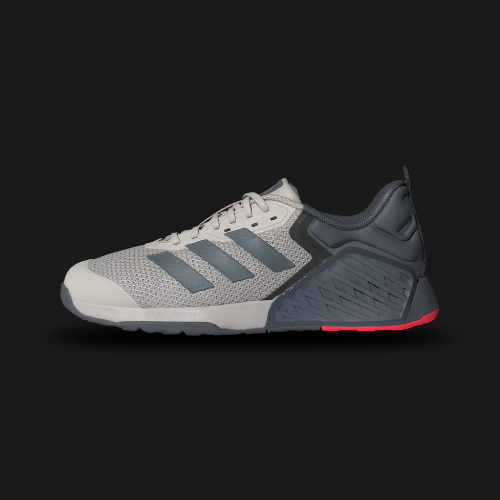 Adidas Dropset 3 Training Shoes in Beige, Onix, and Lucid Red (JI3901). Features a dual-density midsole with a firm heel for lifting stability and soft forefoot for comfort. Engineered mesh upper with HEAT.RDY technology and airflow windows. 6mm drop for grounded stability and Traxion outsole for superior grip. Luxuntique offers 100% authentic Adidas in Sri Lanka.