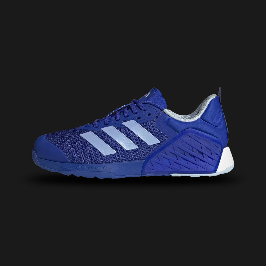 Adidas Dropset 3 Training shoes in Lucid Blue, Blue Spark Metallic, and Chalk White (ID8636). Features a breathable HEAT.RDY mesh upper, dual-density foam midsole, supportive TPU sidewalls, and a grippy Traxion rubber outsole. Luxuntique guarantees 100% authentic footwear.