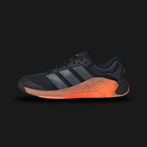 Adidas Dropset 4 Training Shoes in Core Black, Aurora Onix, and Lucid Orange (JR4677). Features a dual-density midsole with a firm stable heel for lifting and a soft forefoot for agility. Includes a wide toe-box, breathable mesh upper with TPU side-wall support, and high-traction Adiwear outsole. Vibrant orange accents. Luxuntique offers 100% authentic Adidas in Sri Lanka.