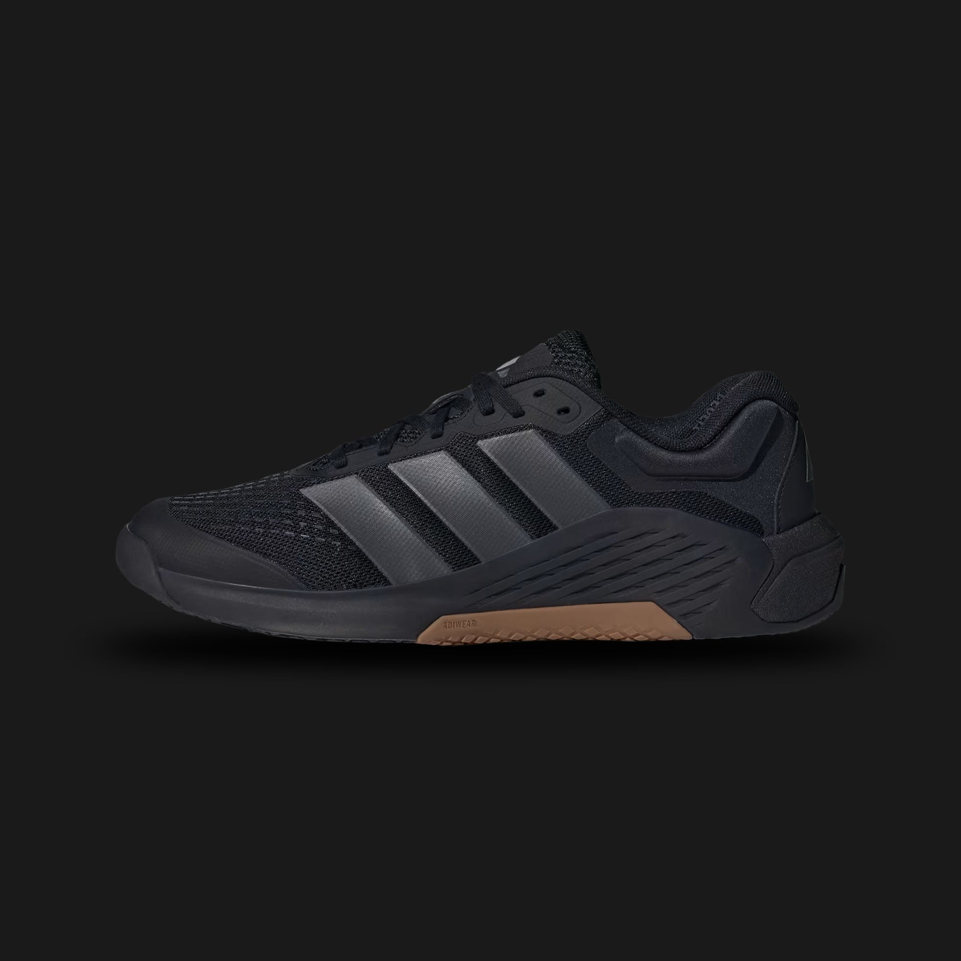 Adidas Dropset 4 Training Shoes in Core Black and Grey Five (JR4673). Features a dual-density midsole with a firm heel for lifting stability and a soft forefoot for movement comfort. Includes a wide toe-box for natural toe splay and a breathable mesh upper with TPU lateral reinforcements. High-traction Adiwear outsole. Luxuntique offers 100% authentic Adidas in Sri Lanka.