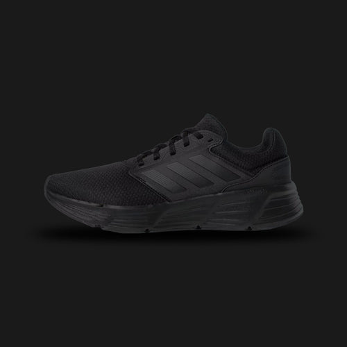 Adidas Galaxy 6 running shoes in a stealthy Triple Black colorway (Core Black, GW4138). Features a lightweight, breathable Core Black mesh upper for maximum ventilation. Includes a thick, sculpted Core Black Cloudfoam midsole for all-day comfort and step-in cushioning, finished with a durable rubber outsole. Luxuntique guarantees 100% authentic Adidas footwear in Sri Lanka.