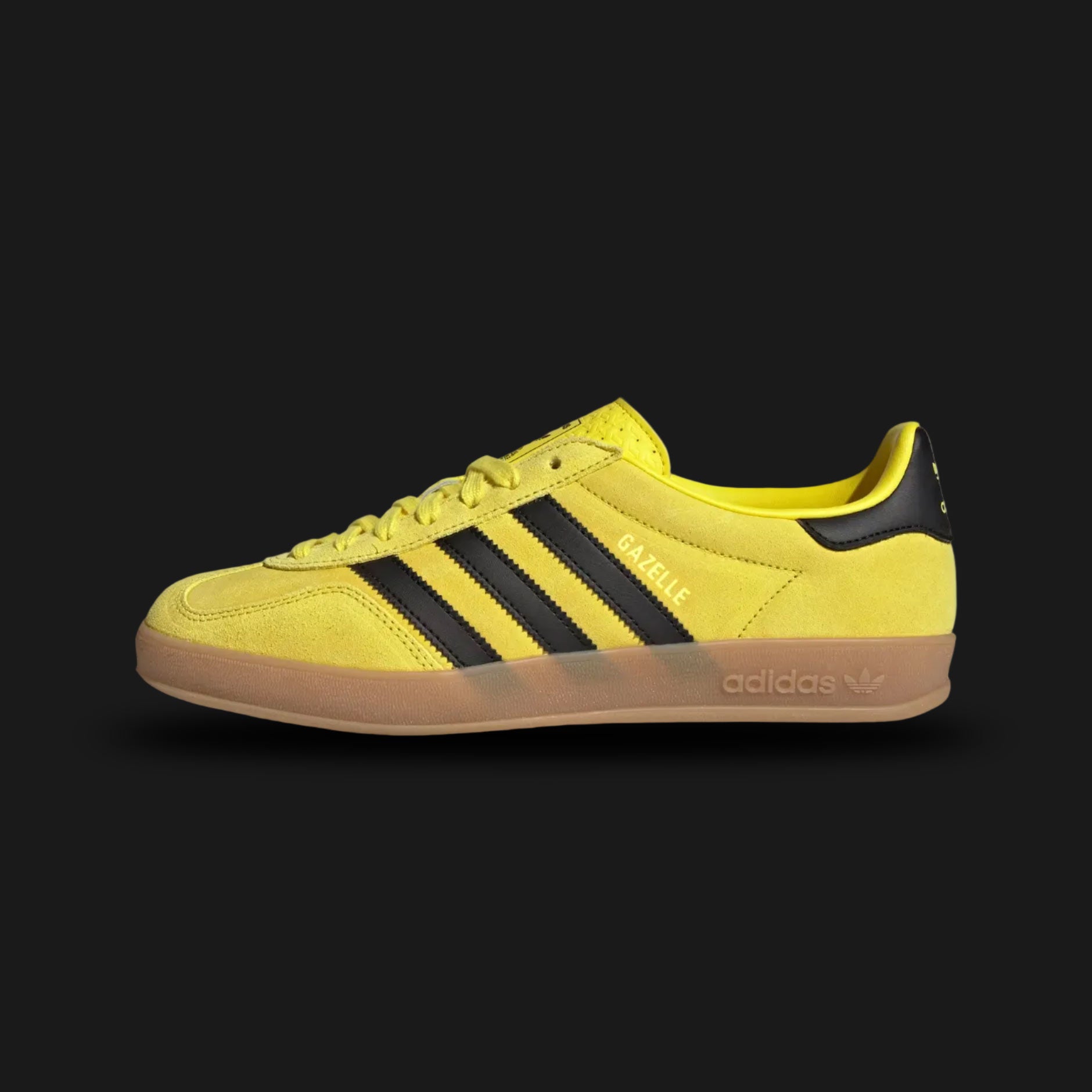 adidas Gazelle Indoor shoes in Shock Yellow, Core Black, and Gold Metallic (Design Code: JR6303). Featuring a premium vibrant yellow suede upper, signature translucent gum rubber outsole, and contrast black leather three-stripes with gold foil branding. Luxuntique offers 100% authentic adidas Gazelle Indoor sneakers at the lowest price in Sri Lanka.