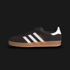 Adidas Gazelle Indoor shoes in Aurora Coffee, Core White, and Gum (HQ5152). Features a premium rich brown suede upper with contrast white leather Three Stripes and metallic gold "Gazelle" branding. Finished with the signature translucent gum rubber outsole. A 1979 archival classic. Luxuntique offers 100% authentic Adidas in Sri Lanka.