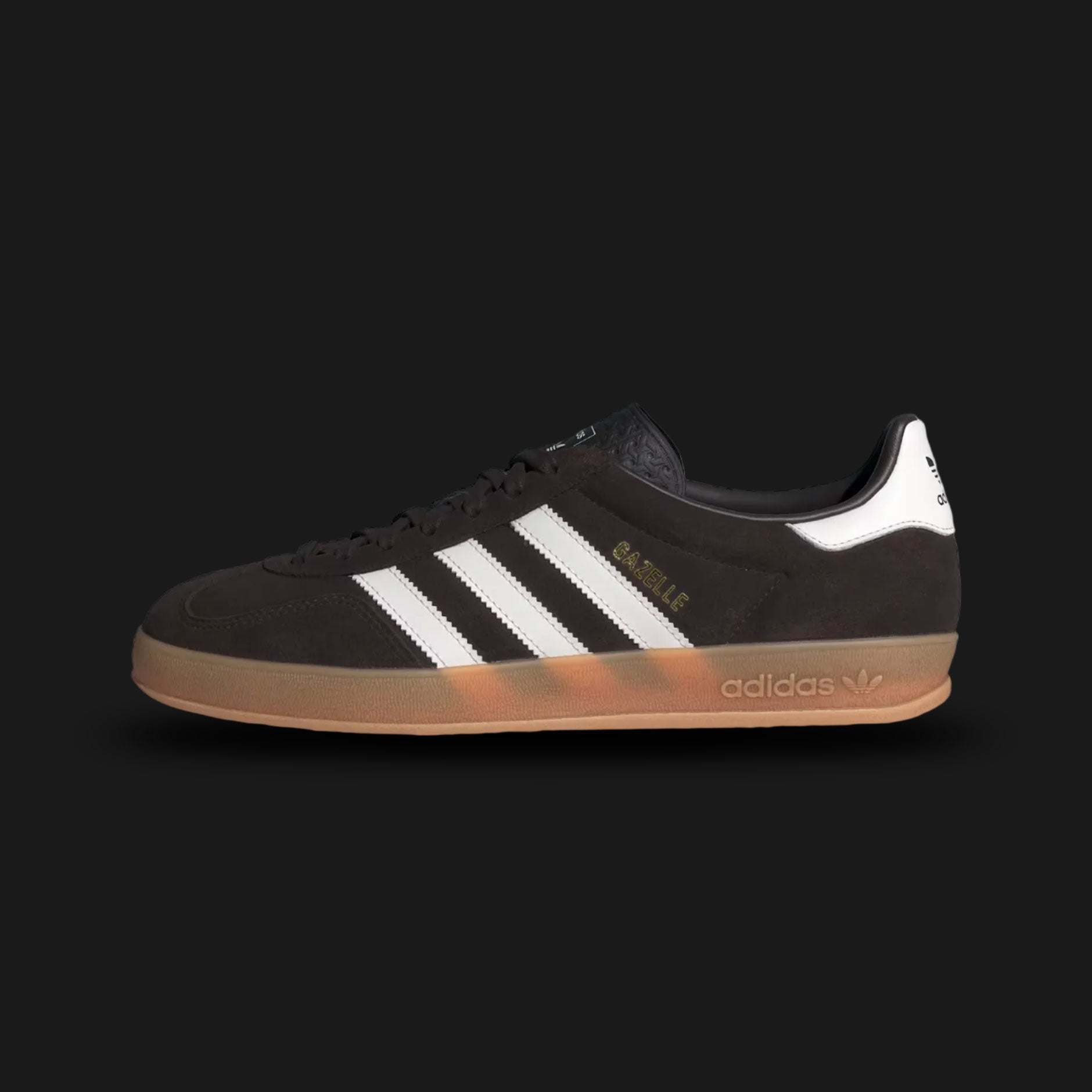 Adidas Gazelle Indoor shoes in Aurora Coffee, Core White, and Gum (HQ5152). Features a premium rich brown suede upper with contrast white leather Three Stripes and metallic gold "Gazelle" branding. Finished with the signature translucent gum rubber outsole. A 1979 archival classic. Luxuntique offers 100% authentic Adidas in Sri Lanka.