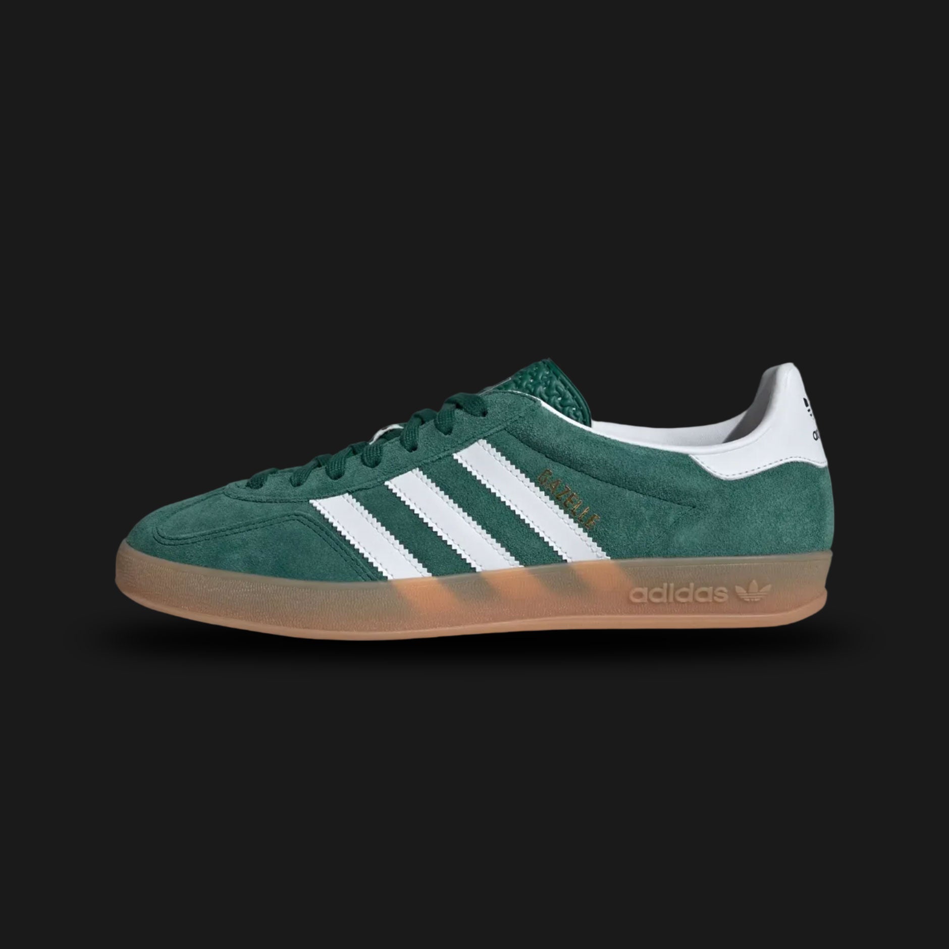 Adidas Gazelle Indoor shoes in Collegiate Green, Cloud White, and Gum (JI2062). Features a premium forest green suede upper with crisp white leather Three Stripes, gold foil Gazelle branding, and the signature translucent gum rubber outsole. A classic terrace-culture silhouette. Luxuntique offers 100% authentic Adidas in Sri Lanka.