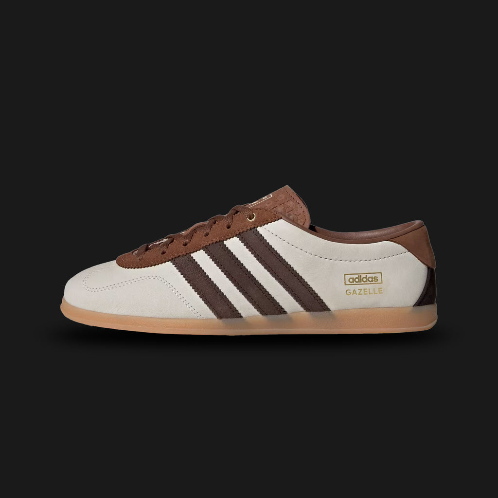 Adidas Gazelle Lo Pro shoes in Off White, Dark Brown, and Preloved Brown (KI4306). Features a premium Off White leather upper with Dark Brown Three Stripes and a Preloved Brown suede T-toe overlay. Sleek low-profile design with a classic gum rubber outsole. Luxuntique offers 100% authentic Adidas in Sri Lanka.
