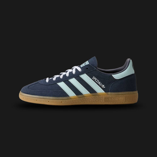 Adidas Germany Handball Spezial shoes in Collegiate Navy and Cloud White (HP3670). Features a premium soft suede upper, classic leather Three-Stripes, a vintage T-toe overlay, and a classic low-profile gum rubber outsole. Luxuntique guarantees 100% authentic footwear in Sri Lanka.