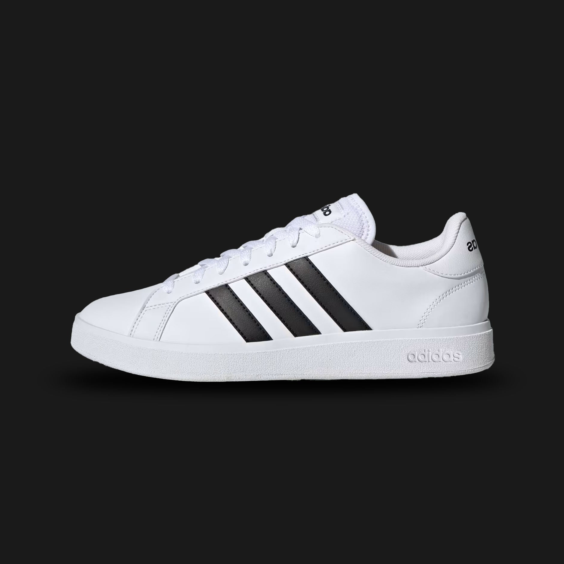 Adidas Grand Court TD Lifestyle Court shoes in Cloud White and Core Black (GW9250). Features a crisp Cloud White synthetic leather upper inspired by classic 1970s tennis footwear. Includes the iconic Core Black 3-Stripes on the sides, subtle Adidas branding on the heel and tongue, and a durable stitched rubber cupsole. Luxuntique guarantees 100% authentic Adidas footwear in Sri Lanka.