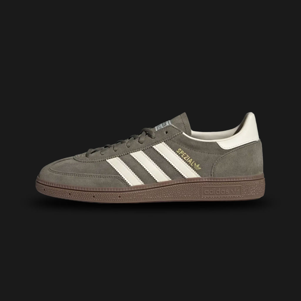 adidas Handball Spezial shoes in Olive Strata green, Cream White, and Gum (Design Code: JR2121). Featuring a premium olive green suede upper, contrast cream leather three-stripes, and a signature gum rubber outsole for a classic indoor-sports-turned-lifestyle look. Luxuntique offers 100% authentic adidas Spezial sneakers at the lowest price in Sri Lanka.