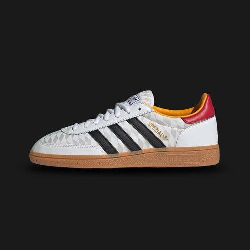 Adidas Handball Spezial shoes in Cloud White, Core Black, and Bold Red (KI6052). Features a premium leather and canvas build, classic T-toe overlay, high-contrast Three-Stripes, and a signature low-profile gum rubber outsole. Luxuntique guarantees 100% authentic footwear in Sri Lanka.