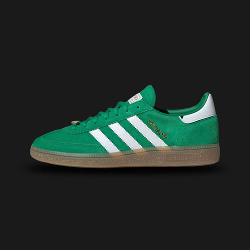 Adidas Handball Spezial shoes in Green, Cloud White, and Gum (JH9232). Features a retro court profile with a premium suede upper, crisp leather Three-Stripes branding, and a traditional low-profile gum rubber outsole. Luxuntique guarantees 100% authentic "Adidas" footwear in Sri Lanka.