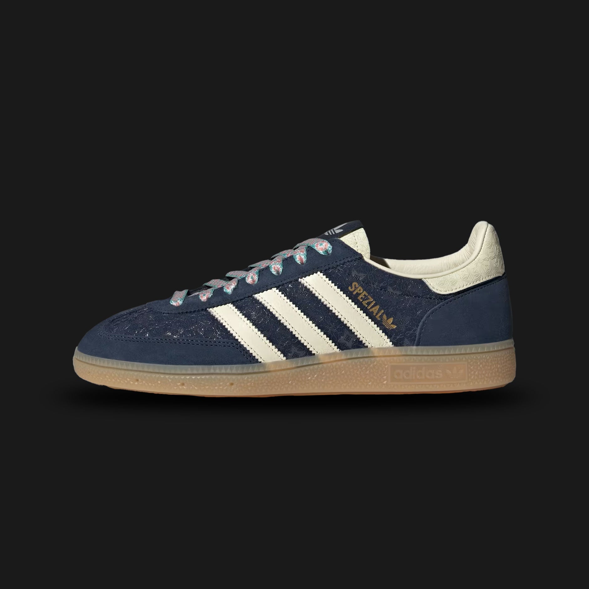 Adidas Handball Spezial shoes in Night Indigo, Cream White, and Gum (KJ5595). Features a classic terrace silhouette with a premium Night Indigo blue suede upper and the signature T-toe overlay. Includes crisp Cream White 3-Stripes, subtle vintage branding, and a retro Gum rubber traction outsole. Luxuntique guarantees 100% authentic Adidas footwear in Sri Lanka.