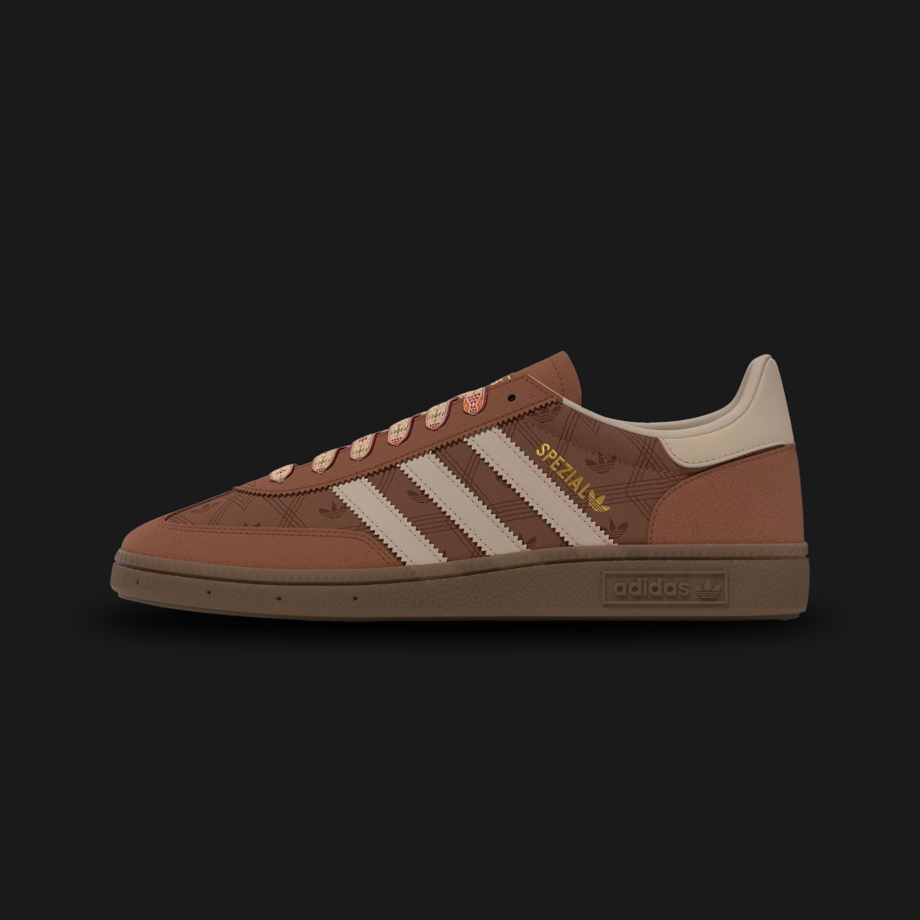 adidas Handball Spezial shoes in Preloved Brown, Wonder Beige, and Gum (KJ0695). Features a classic terrace silhouette with a premium suede upper, a retro T-toe overlay, and Wonder Beige 3-Stripes. Finished with a durable, low-profile gum rubber outsole. Luxuntique offers 100% authentic adidas in Sri Lanka.