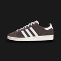 Adidas Jabbar Lo shoes in Aurora Coffee, Cloud White, and Off White (JP8985). Features a premium smooth leather upper with serrated Cloud White 3-Stripes and a signature suede T-toe overlay. Classic low-profile basketball silhouette with an aged-look Off White rubber cupsole and Kareem Abdul-Jabbar tongue branding. Luxuntique offers 100% authentic Adidas in Sri Lanka.