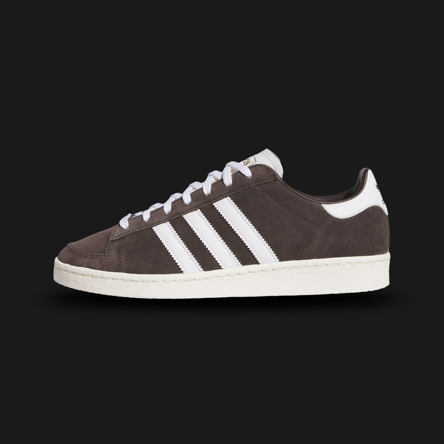 Adidas Jabbar Lo shoes in Aurora Coffee, Cloud White, and Off White (JP8985). Features a premium smooth leather upper with serrated Cloud White 3-Stripes and a signature suede T-toe overlay. Classic low-profile basketball silhouette with an aged-look Off White rubber cupsole and Kareem Abdul-Jabbar tongue branding. Luxuntique offers 100% authentic Adidas in Sri Lanka.