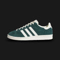 Adidas Jabbar Lo shoes in Aurora Ivy and Off White (JR4354). Features a premium smooth leather upper in forest green with serrated off-white 3-Stripes and a suede T-toe overlay. Classic low-profile 1970s basketball silhouette with an aged-look rubber cupsole and Kareem Abdul-Jabbar tongue branding. Luxuntique offers 100% authentic Adidas in Sri Lanka.