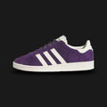 Adidas Jabbar Lo shoes in Aurora Plum and Off White (JR4355). Features a premium smooth leather upper in deep plum with serrated off-white 3-Stripes and a signature suede T-toe overlay. Classic low-profile 1970s basketball silhouette with an aged-look rubber cupsole and Kareem Abdul-Jabbar tongue branding. Luxuntique offers 100% authentic Adidas in Sri Lanka.