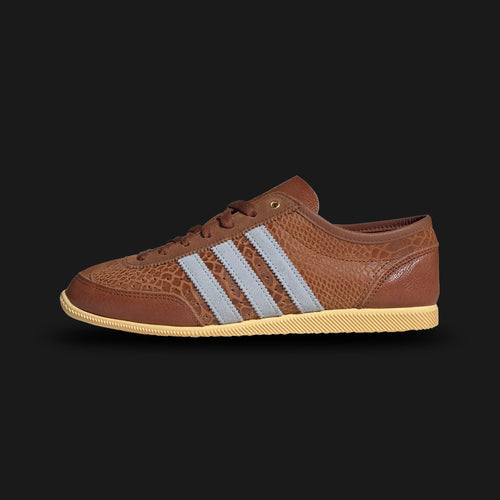 Adidas Japan Decon shoes in Dusky Bronze, Crystal Sky, and Orange Tint (IH1622). Features a premium deconstructed soft leather upper in Dusky Bronze with light blue Crystal Sky Three Stripes. Ultra-flexible, low-profile design with a slim rubber outsole. Luxuntique offers 100% authentic Adidas in Sri Lanka.