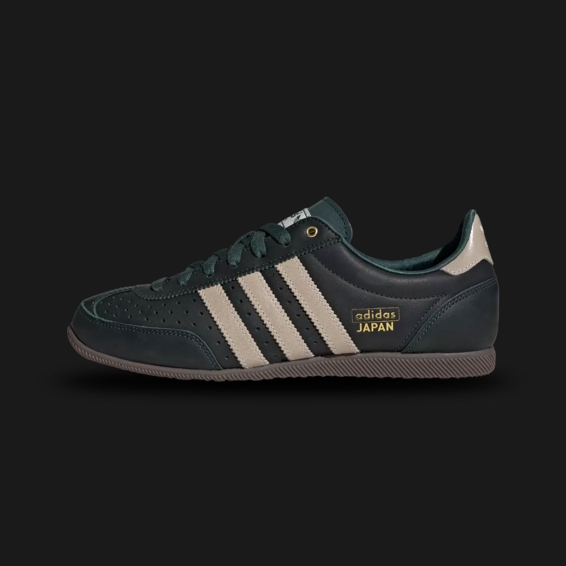 Adidas Japan shoes in Mineral Green, Crystal Sand, and Wonder White (IG4278). Features a premium Mineral Green leather upper with soft Crystal Sand Three Stripes and Wonder White accents. Signature low-profile archival design with a slim rubber outsole. Luxuntique offers 100% authentic Adidas in Sri Lanka.