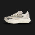 Adidas Lightblaze shoes in Off White, Silver Metallic, and Grey One (JQ7221). Features a lightweight breathable textile mesh upper, metallic 3-Stripes, responsive cushioned foam midsole, and a durable rubber outsole. Luxuntique guarantees 100% authentic footwear in Sri Lanka.