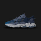 Adidas OZWEEGO shoes in Dark Marine, Preloved Ink, and Night Indigo (Design Code: ID0672). Featuring a tonal blue layered mesh and suede upper, signature Adiprene+ forefoot cushioning, and Adiprene heel cushioning for high-impact absorption. Includes the iconic translucent support tube and chunky EVA midsole. Luxuntique offers 100% authentic Adidas OZWEEGO sneakers at the lowest price in Sri Lanka