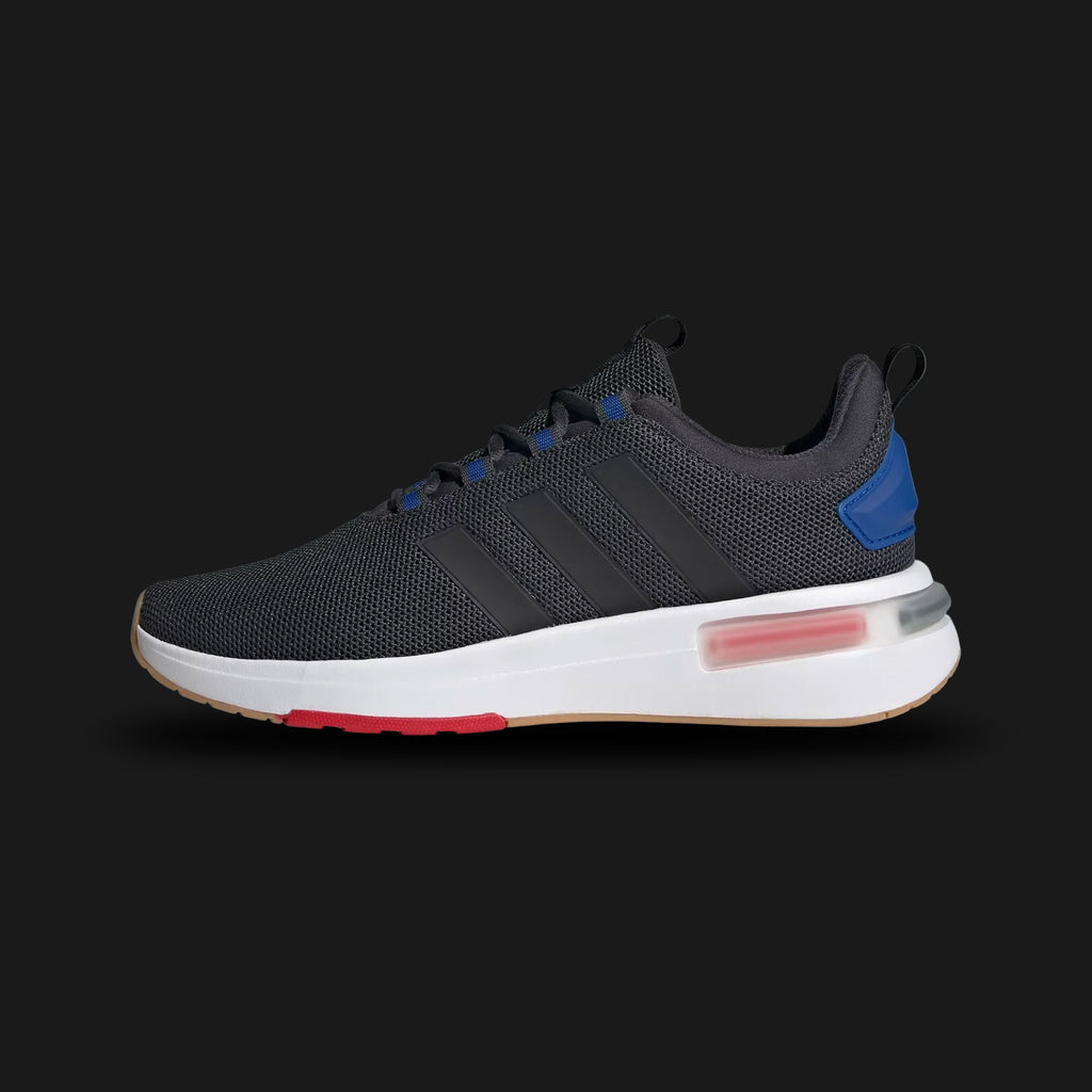adidas Racer TR23 shoes in Carbon, Core Black, and Royal Blue (Design Code: IG7328). Featuring a breathable textile mesh upper, supportive synthetic overlays, and a plush Cloudfoam midsole for all-day cushioning. Detailed with vibrant Royal Blue accents on the heel pull-tab and tongue. Luxuntique offers 100% authentic adidas performance sneakers at the lowest price in Sri Lanka.