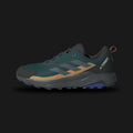 Adidas Terrex Anylander Hiking Shoes in Aurora Ivy, Grey Six, and Cardboard (JQ9954). Features a durable textile upper with synthetic overlays and a gusseted tongue to keep out debris. Includes a lightweight EVA midsole for cushioning and a high-traction Traxion outsole for grip on uneven terrain. Reinforced toe cap for protection. Luxuntique offers 100% authentic Adidas in Sri Lanka.