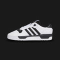 Adidas Rivalry Low shoes in Cloud White and Core Black (IG1474). Features a retro 80s basketball-inspired premium leather upper, perforated toe box details, and a durable stitched rubber cupsole. Luxuntique guarantees 100% authentic "Adidas" performance footwear in Sri Lanka.