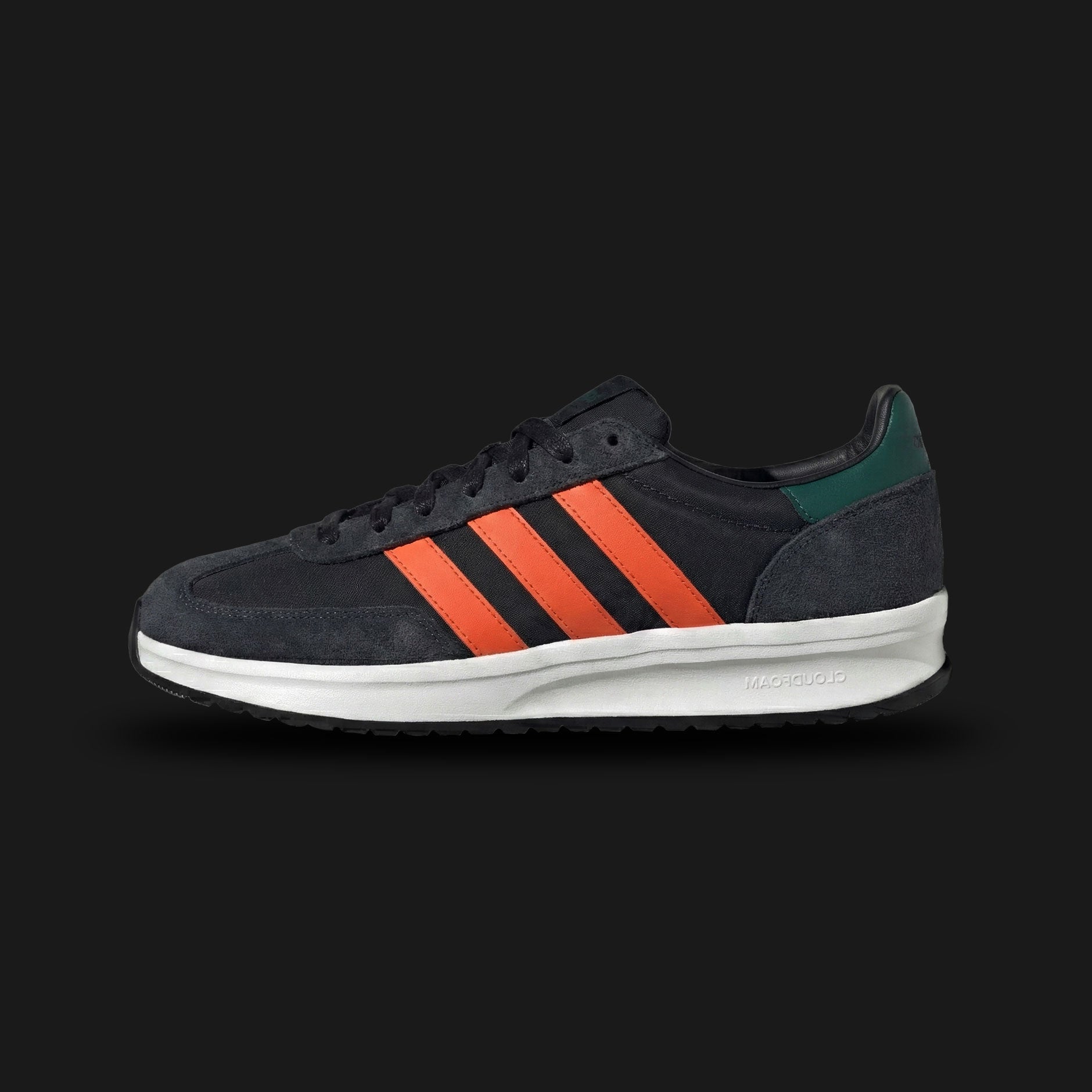 adidas RUN 70s 2.0 shoes in Core Black, Semi Impact Orange, and Carbon (Design Code: IH8591). Featuring a retro-inspired textile upper with premium suede overlays in Core Black and Carbon, accented by vibrant Semi Impact Orange three-stripes and heel detailing. Equipped with a cushioned Cloudfoam midsole for all-day comfort and a vintage-style rubber outsole. Luxuntique offers 100% authentic adidas retro running sneakers at the lowest price in Sri Lanka.
