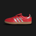 Adidas Samba LT shoes in Better Scarlet, Silver Metallic, and Gum (JS3938). Features a football-inspired premium mesh and suede upper, a distinctive oversized fold-over tongue, and a classic low-profile gum rubber outsole. Luxuntique guarantees 100% authentic "Adidas" footwear in Sri Lanka.