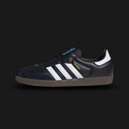 Adidas Samba OG shoes in Core Black, Cloud White, and Gum (B75807). Features a full-grain leather upper, suede T-toe overlay, contrasting serrated 3-Stripes, and an iconic gum rubber outsole. Luxuntique guarantees 100% authentic footwear.