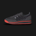 Adidas SL 72 RS Audi Revolut F1 Team shoes in Utility Black and Hi-Res Red (KJ1203). Features a premium reshaped leather and technical textile upper with vibrant red F1 racing accents. Includes collaborative Audi Revolut branding on the tongue and heel, a thickened EVA midsole for modern cushioning, and a signature ripple rubber outsole. Luxuntique offers 100% authentic Adidas F1 gear in Sri Lanka.