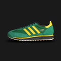 adidas SL 72 RS Jamaica shoes in Green, Yellow, and Core Black (Design Code: IG2133). Featuring a lightweight green nylon upper with matching suede overlays, vibrant yellow serrated three-stripes, and a textured Ecotex tongue. Finished with a durable black rubber outsole and a yellow midsole wedge for a retro track look. Luxuntique offers 100% authentic adidas heritage sneakers at the lowest price in Sri Lanka.