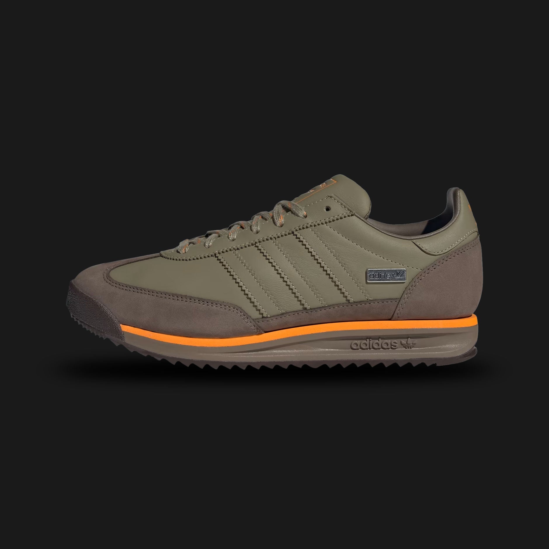 Adidas SL 72 RS shoes in Orbit Green, Cargo Brown, and Bright Orange (JR8766). Features a premium smooth leather upper with serrated leather 3-Stripes and a signature T-toe construction. Includes a metallic heel clip and a thicker EVA midsole for modern comfort. Classic ripple rubber outsole for heritage traction. Luxuntique offers 100% authentic Adidas in Sri Lanka.