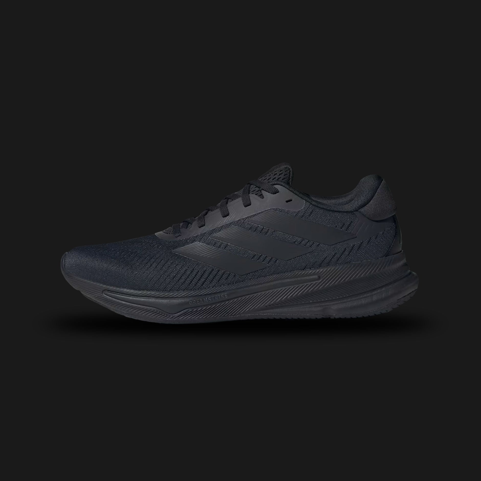 Adidas Supernova Ease shoes in Core Black and Carbon (IH2580). Features a lightweight breathable textile upper, seamless tonal 3-Stripes branding, a responsive Dreamstrike cushioned foam midsole, and a durable rubber outsole. Luxuntique guarantees 100% authentic footwear.