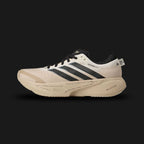 adidas Supernova Rise 3 running shoes in Off White, Core Black, and Onix (KI3617). Features a breathable Off White engineered mesh upper, a plush Dreamstrike+ foam midsole for daily running comfort, and a bottom Support Rod system for smooth transitions. Includes sharp Core Black accents and a durable Adiwear outsole. Luxuntique offers 100% authentic adidas in Sri Lanka.