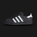 Black Adidas Superstar sneaker with white stripes (Design code: EF5398) on a light gray background. Luxuntique offers 100% authentic Adidas sneakers at the lowest prices in Sri Lanka.
