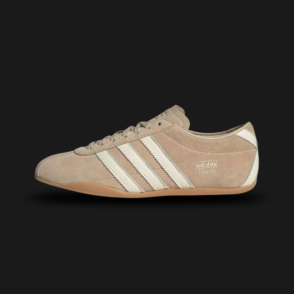Adidas Tokyo in Stone Khaki, Off White, and Gum (KI3583). Features a premium Stone Khaki suede and leather upper with Off White Three Stripes and a classic low-profile gum rubber outsole. Iconic Tokyo-inspired heritage design with a sleek, minimal silhouette. Luxuntique offers 100% authentic Adidas in Sri Lanka.