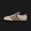 adidas Tokyo Shoes in Wonder White, Preloved Brown, and Gum (KJ0695). Features a classic terrace silhouette with a premium suede and leather upper, a retro T-toe overlay, and Preloved Brown 3-Stripes. Finished with a durable, low-profile gum rubber outsole. Luxuntique offers 100% authentic adidas in Sri Lanka.