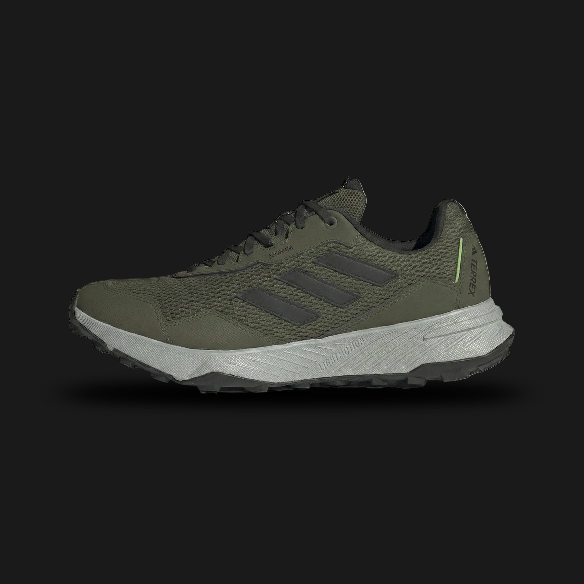 adidas Tracefinder trail running shoes in Khaki, Silver Pebble, and Core Black (Design Code: IE5911). Featuring a breathable mesh upper with protective synthetic overlays and a rugged Traxion outsole for maximum grip on uneven terrain. Designed with a lightweight EVA midsole for cushioned comfort during outdoor runs. Luxuntique offers 100% authentic adidas trail sneakers at the lowest price in Sri Lanka.