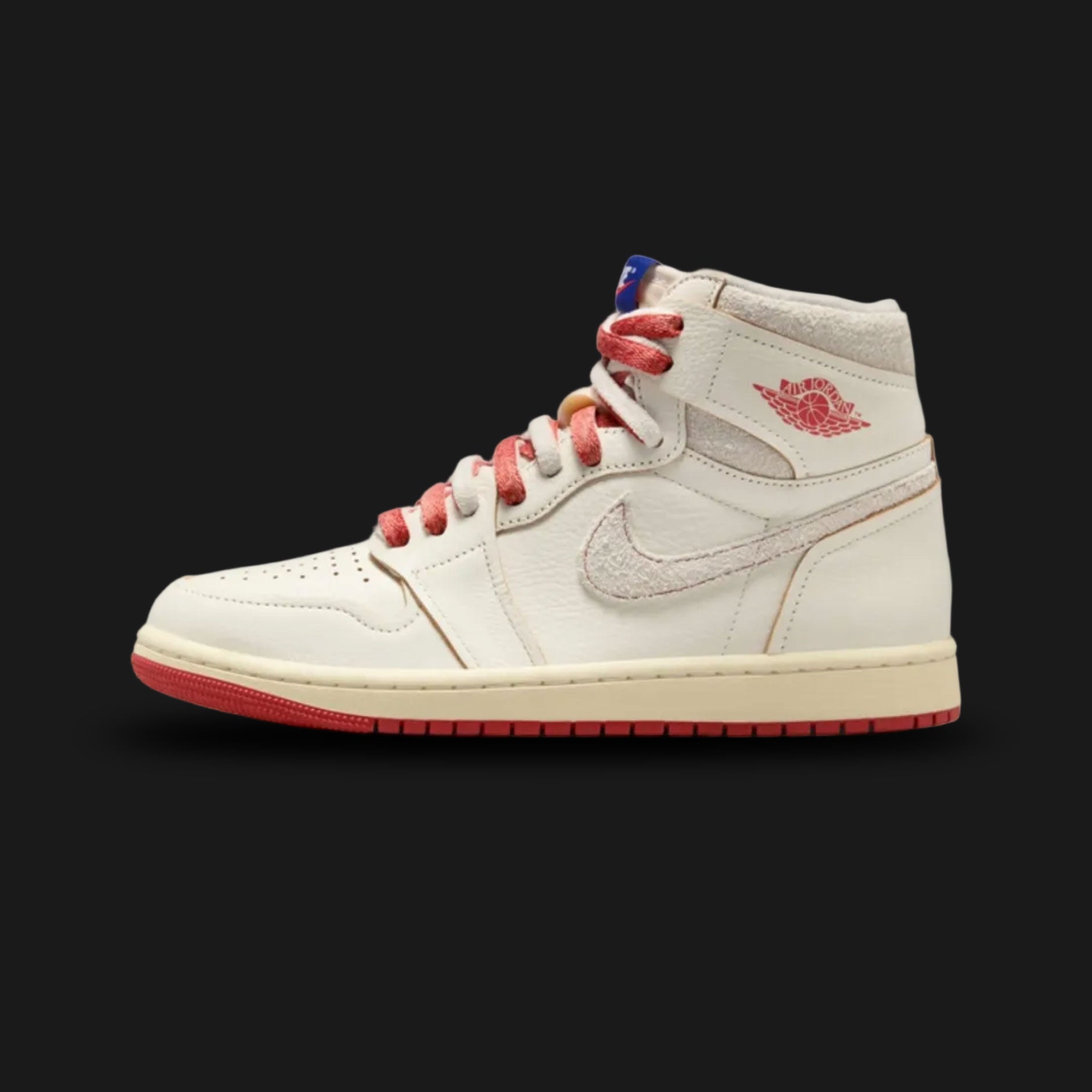 Air Jordan 1 High OG 'Rare Air' lifestyle sneakers in Sail, Light Bone, and Cinnabar (Design Code: DB4612-100). Featuring a premium, vintage-inspired leather upper that seamlessly blends a warm, creamy Sail base with cool Light Bone overlays. Highlighted by striking Cinnabar red accents on the Nike Swoosh, outsole, and the exclusive 'Air Jordan' text branding on the ankle collar that defines the historic Rare Air series. Resting on a pre-aged Sail foam midsole housing concealed Air cushioning. Luxuntique of