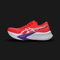 Asics MAGIC SPEED 4 shoes in Flash Red and White (1012B676-600). Features a lightweight engineered mesh upper, a full-length carbon plate for propulsion, double-layer FF BLAST PLUS ECO foam, and a durable ASICSGRIP rubber outsole. Luxuntique guarantees 100% authentic footwear.