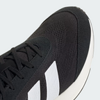 Adidas Lightshift JH9315 - Heel & Midsole Close-up showing Lightmotion Text Embossed on White Midsole, Black Mesh Upper & White Three Stripes