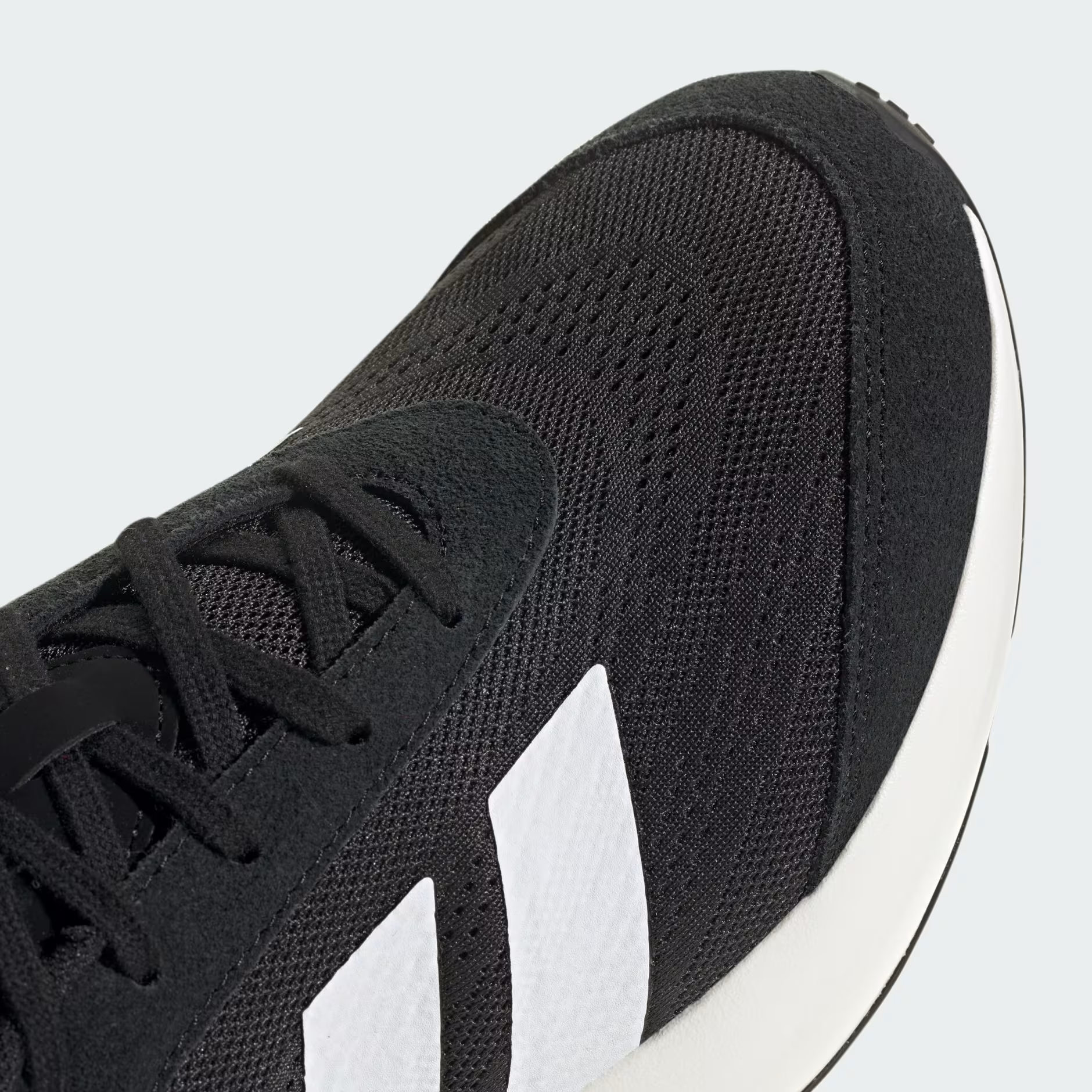 Adidas Lightshift JH9315 - Heel & Midsole Close-up showing Lightmotion Text Embossed on White Midsole, Black Mesh Upper & White Three Stripes