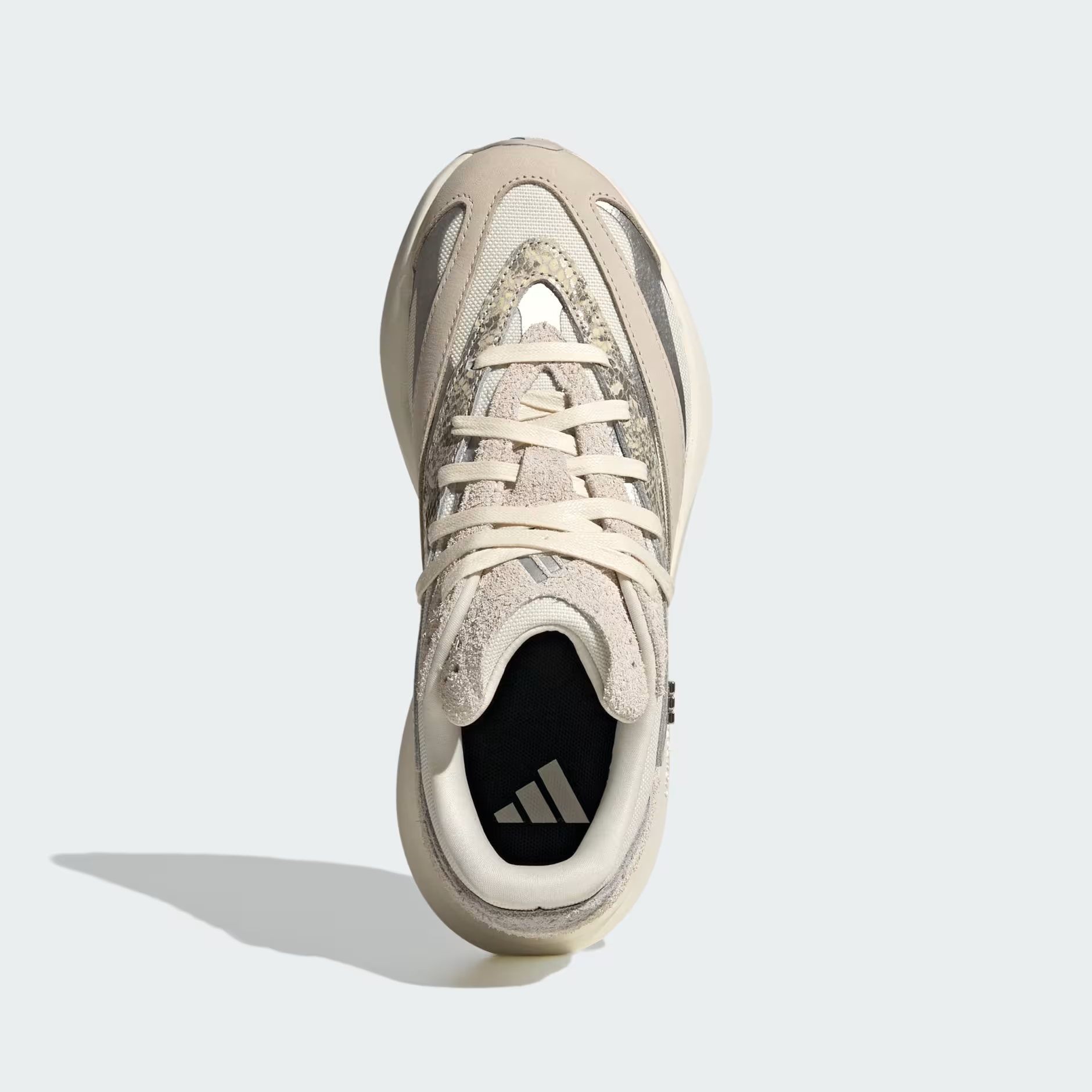 Adidas Lightblaze JQ7221 - Outsole Top-Down on White Background showing Off White Rubber Traction Pattern with Herringbone Flex Grooves, Waist Cutout & Heel Pods